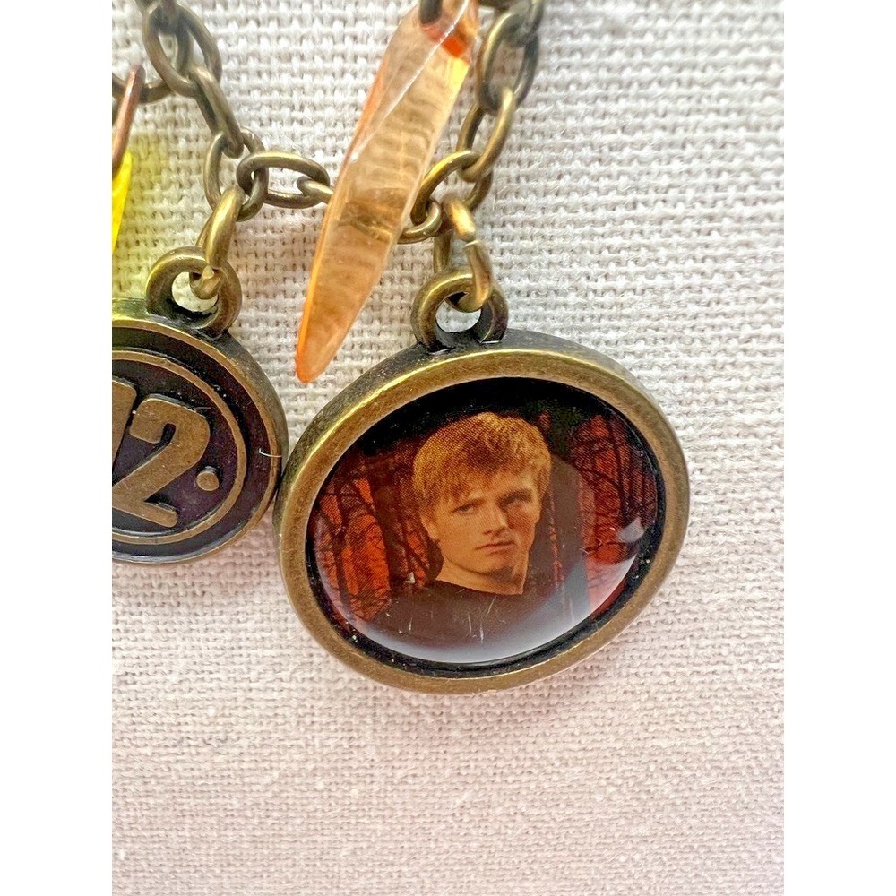 Hunger Games Necklace Peeta Medallion District 12 Official Lionsgate Official - Picture 10 of 14